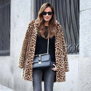 Chic women's faux fur leopard print mid-length coat with a trendy urban leopard pattern