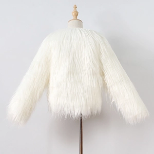 Close-up of white faux fur kids coat showing the fluffy texture and thick material