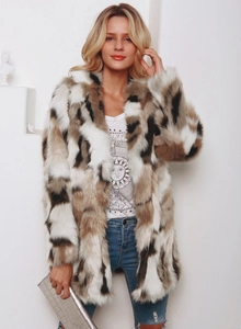 Close-up of the long sleeve faux fur coat featuring a notch lapel and multi-color texture