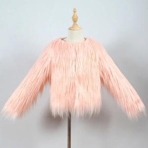 Detail view of pink faux fur short jacket for kids with long plush texture