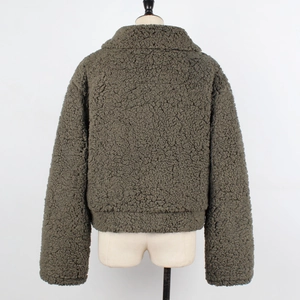 Close-up of olive green sherpa jacket back featuring plush texture and wide collar
