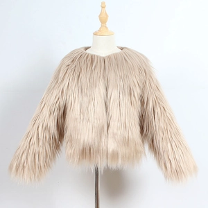 Detailed view of apricot faux fur child jacket with soft long wool texture and round neck