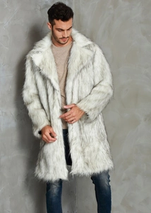 Detail of white faux fur coat with black tips, wide lapel, and soft textured winter fabric
