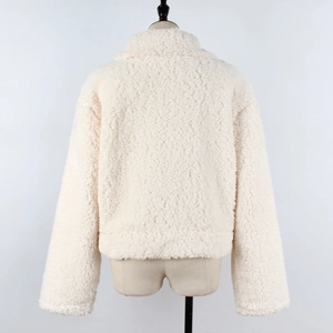 Detailed back view of soft beige faux lamb wool jacket showing plush texture on mannequin