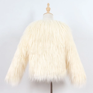 Detail view of the back of this white faux fur kid's jacket with long fluffy texture