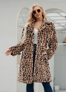 Detail view of the soft faux fur texture and classic leopard print on the winter coat