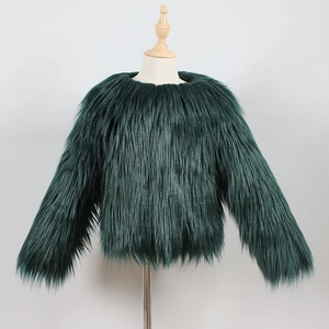 Close-up of kids dark green faux fur coat featuring thick shaggy texture and round collar
