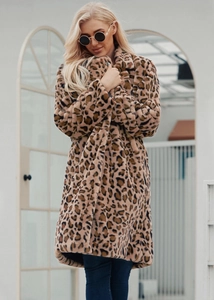 Detailed texture of leopard print faux fur coat with stylish notched lapels and thick pile