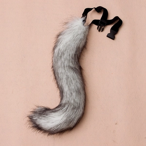 Adjustable faux fur fox tail accessory with grey gradient and plastic buckle clip