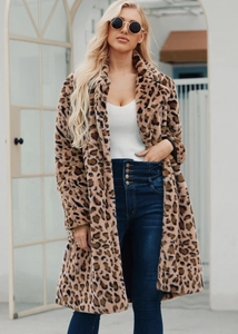 Detail shot of leopard print faux fur coat with lapel collar and soft premium texture