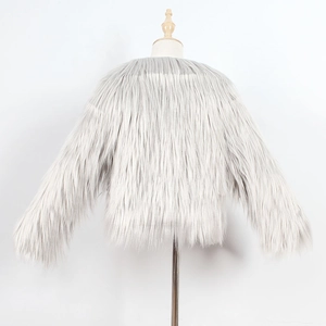 Detailed texture of light grey faux fur coat showing long plush fibers and soft shine