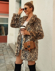 Chic leopard print faux fur coat detail with stylish autumn city fashion layering outfit