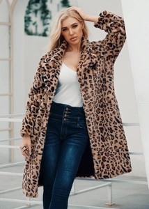 Detail of leopard print faux fur coat with lapel collar and high waist jeans with gold buttons