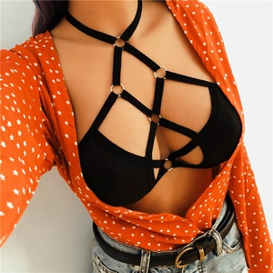 Sexy black elastic body harness featuring golden rings and crossover strappy design