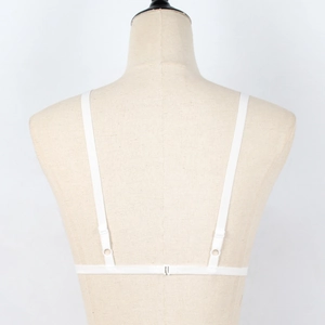Detailed back view of white lace bralette with slim adjustable straps and hook closure
