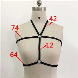 Detail of black elastic body harness featuring metal rings and key measurements