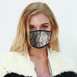 Detailed close-up of the black lace texture and breathable mesh on the washable face mask