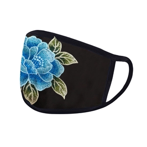 Detailed blue peony floral embroidery on a black breathable fabric face mask with soft ear loops