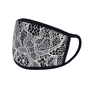 Detail of breathable sun-protective face mask featuring elegant white floral lace overlay