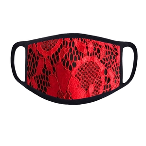 Detail view of red floral lace face mask with black elastic trim and breathable fabric