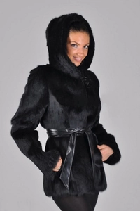 Detail of black faux fur coat featuring thick hood and wide leather waist belt