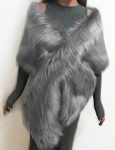 Detail of silver grey faux fur shawl showing high-density texture and cross-wrap design