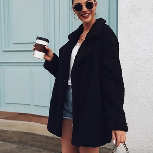 Women's black teddy faux fur jacket with stylish lapel collar in a loose fit casual style
