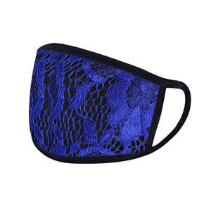 Close-up of royal blue lace fabric texture and elastic black trim on breathable face mask
