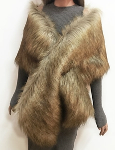 Detail view of brown faux fur bridal shawl with cross-over design and thick plush texture