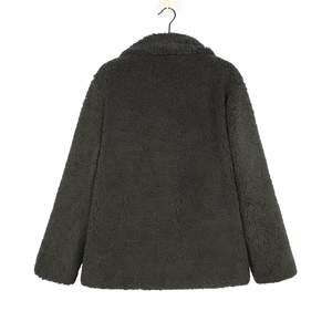 Detailed back view of a dark green faux shearling jacket with warm plush texture