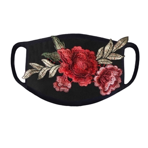 Close-up of elegant red rose embroidery on breathable black cotton face mask for adults