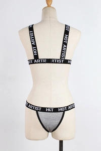 Detail of grey cotton lingerie set with black HOT ARTIST elastic lettered waistbands