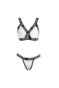 Close-up of elastic bands with HOT ARTIST lettering on white two-piece lingerie set
