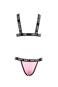 Detail of pink and black lingerie set with HOT ARTIST elastic lettered straps and band