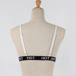Detail view of white sports bra with HOT ARTIST letter print on elastic underband