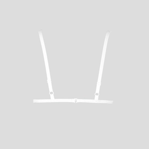 Close-up of white minimalist lingerie strap with adjustable metal sliders and slim design