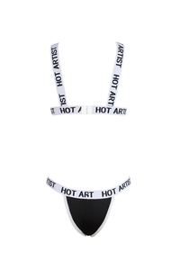 Detail of black and white lingerie set with HOT ARTIST letter printed elastic straps