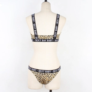 Back view of leopard print lingerie set featuring branded elastic bands and sexy baby print