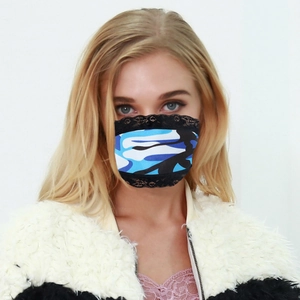 Detail of blue camouflage sun protection mask with delicate black lace trim for women