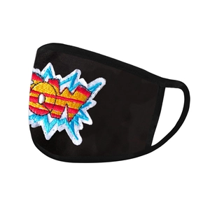 Detailed view of black fabric mask featuring a colorful 'POW!' comic embroidery patch