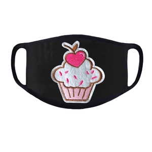 Detail of black breathable mask with a cute embroidered cupcake and pink heart patch