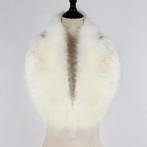 Close-up of white faux fur shawl with a soft texture and high-density fluffy fibers