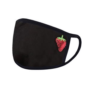 Detail of breathable black cotton face mask featuring delicate strawberry embroidery