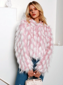 Detail of pink and white faux fur coat with feathered texture and quilted handbag