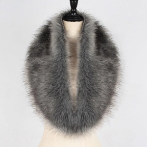 Close-up of thick gray gradient faux fox fur collar scarf with dense fluffy texture