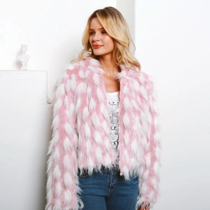 Detailed view of the soft faux fur texture on this pink and white cropped jacket