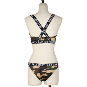 Rear view of camouflage lingerie set with white SE-XY BABY lettered elastic bands