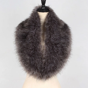 Close-up detail of dark grey faux fur collar with silver tips and fluffy texture