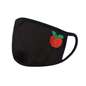 Close-up of black breathable mask featuring a detailed red apple embroidery on the side