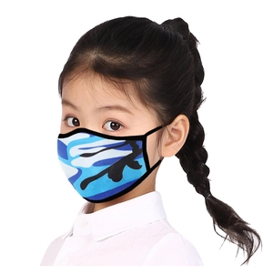 Profile view of an Asian girl wearing a blue camo breathable fabric face mask for kids
